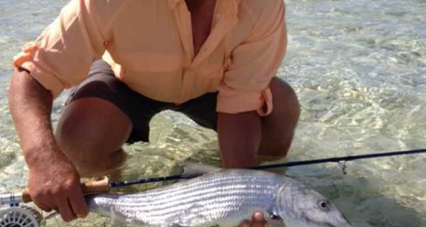 Photo of Darren Clarke and his catch of the day, a nice bonefish.