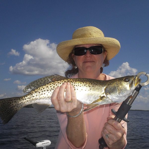 Pat Shannon of Lakeland shows off her 20" speckled Sea trout that was caught in Crystal River.