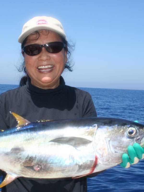 Hyon Cabral of Crescent City, CA caught her very first yellowfin tuna during the Penn Fishing University trip aboard Searcher.