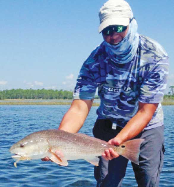 Ernie Cavitt sight fished this nice Redfish on a Slayer Inc S.S.T Pepper Flake on the flats in West Bay, Panama City on his Paddle Board. 