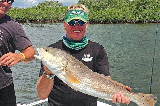 Rod Shidler with a 31 inch Red Fish