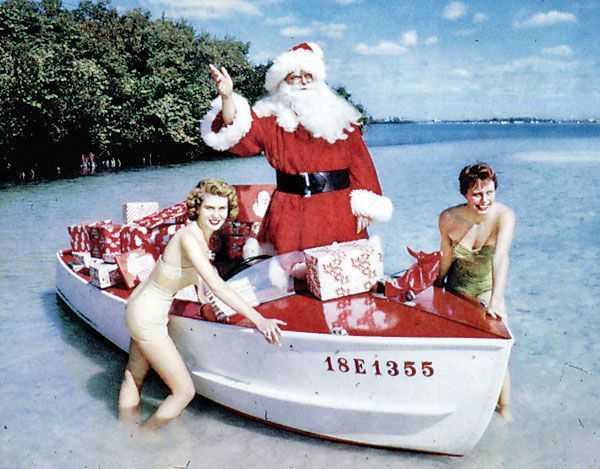 11-Santa-Claus-in-a-boat-in-1965-from-FSA-JJS1744b