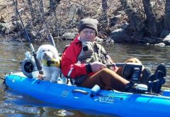 Bill “Billy Bass” Eicher with teammate “Brady” during a sweetwater trip on the Mystic River.