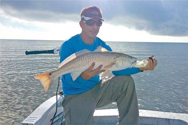  Jason Callaghan with a nice oversized redfish caught around Lanark.