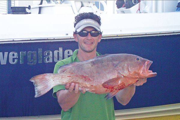 Brian Showman with this nice 12lb. red grouper caught on October 11, 2013.