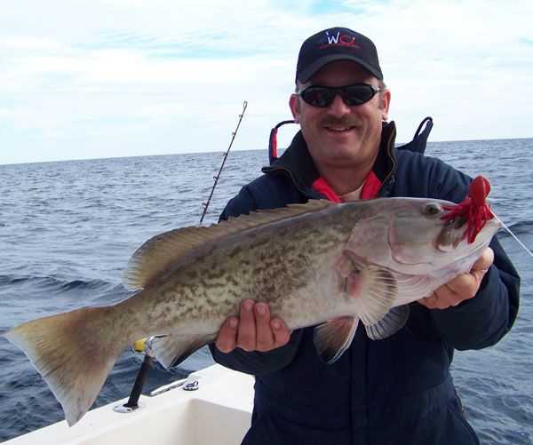 Brian Slesinski, CAM co-publisher, with a nice Grouper.