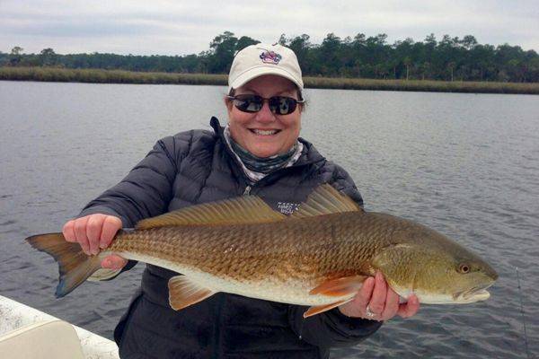 Sue takes a break from Blue Abaco, in Tally to catch a bunch of redfish!