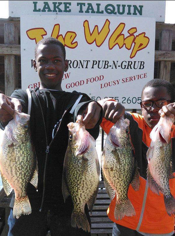 Michael and Darnell of Pensacola. Both boys play a high level of football. Dad took time out of their busy schedule to take them fishing on a guided trip for their birthdays.