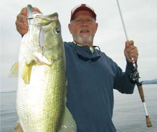 Greg Ballard of Birmingham AL with a 8.25 giant caught during the shad spawn of 2012 in Lake Guntersville. 