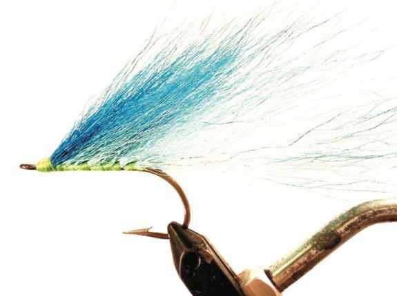 Blue High- Tied Tarpon Streamer – Nothing more than bucktail and a hook. Rather old- school, but I still keep a few in my box.