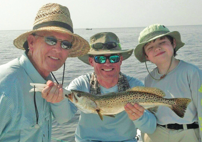 Three generations of Jordan’s showing off Aiden’s big trout.