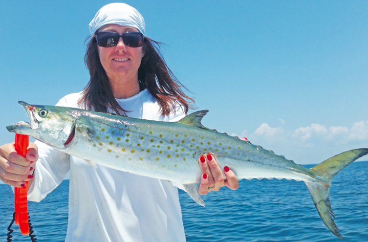 Tamara Mc with a big spanish that ate a squirrel fish, while cobia hunting!