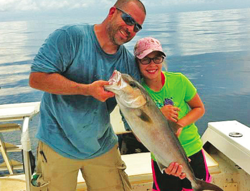 Father/Daughter Team, Erik and Kiré Nystrom join forces to land Kiré’s first amberjack.