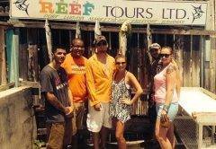 Happy Reef Tour customers with a variety of deep sea catches.