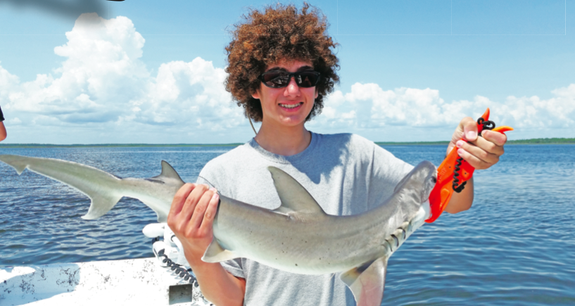 My brother Taylor with a nice bonnethead shark.