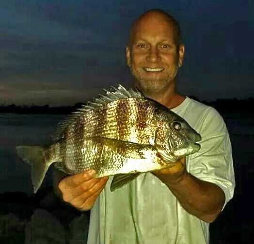 David Giuffrida with a 20-inch sheepshead caught at Jetty Park, Fort Pierce inlet on a basic sheepshead rig with live shrimp. PHOTO CREDIT: Tracy Giuffrida.