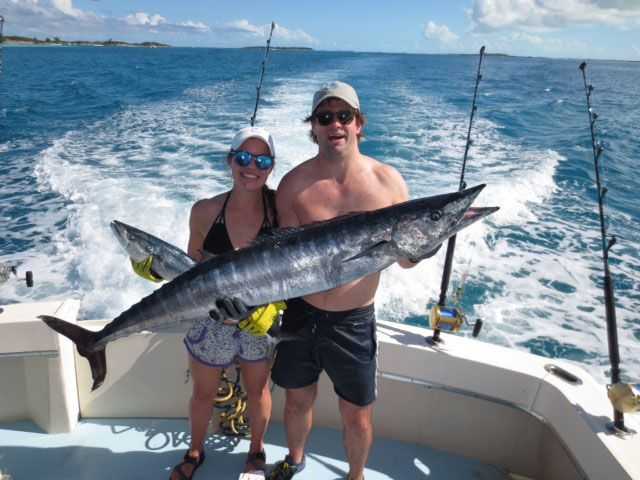 George O’Conner Jr. and wife with a big Exuma wahoo. PHOTO CREDIT: Fish Rowe Charters.