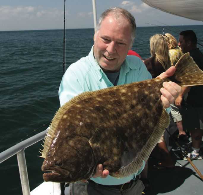 Big Fluke...Doormat fluke love structure and they are suckers for 5” Berkley Gulp! Swimming Mullets. The author decked this big flattie aboard Capt. Ed Beneduci’s Montauk Star. Photo By: Tom Schlichter photo.