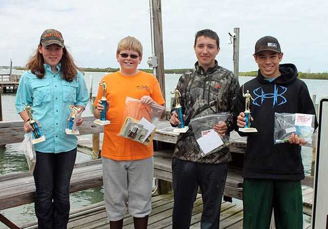 Tournament placers Savannah Ward, Andrew Evans, Ryan Wells and Colton Hester. PHOTO CREDIT: Treasure Coast Casters.