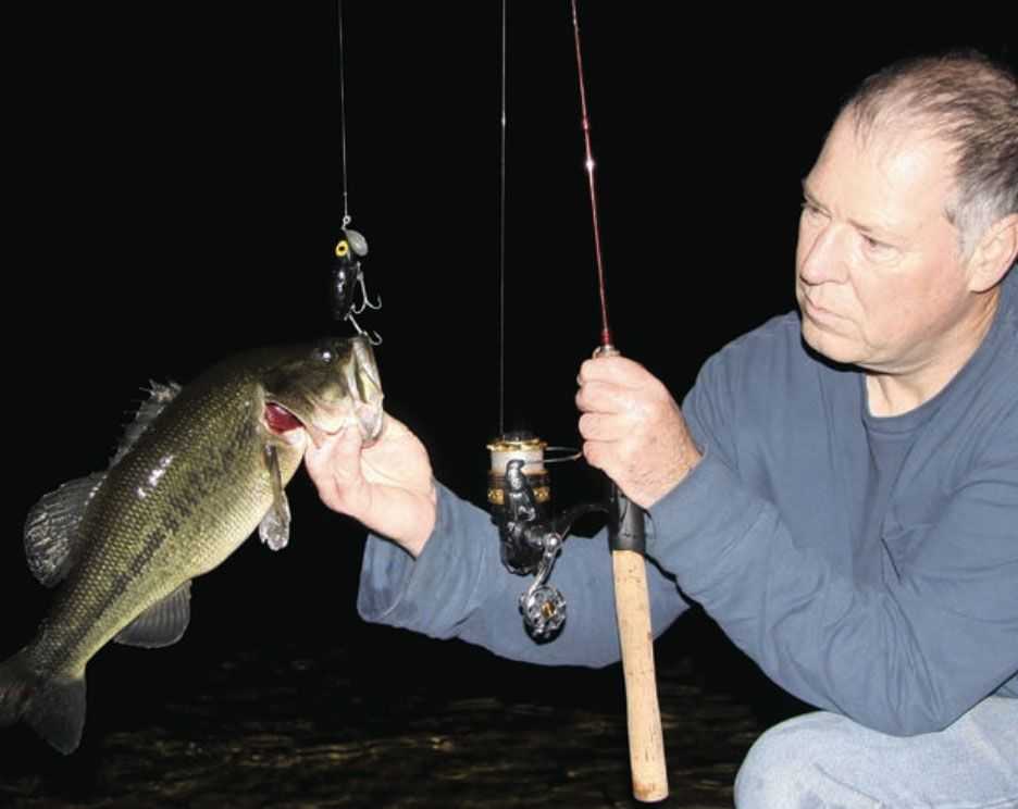 Late Night Largemouths: Photo by Ryan Schlichter. Big bass often feed on the late shift even early in the summer season. Tempt them with large surface lures – but be sure to bring along plenty of bug spray.