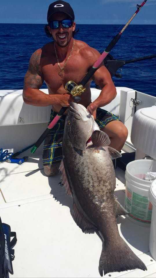 Mike Cram with a 49.8-pound gag grouper caught out of Sebastian in late June. PHOTO CREDIT: Heather Blake.