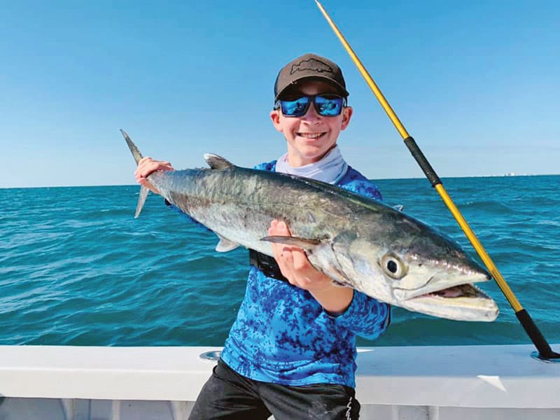 Awesome junior angler had a fun day a few miles out aboard the Fire Fight with Capt. Joe catching hammers, kings—and more!