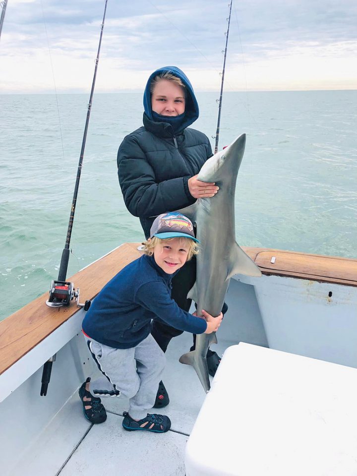 Was a tad chilly, but the Crain crew had a blast catching the sharks!