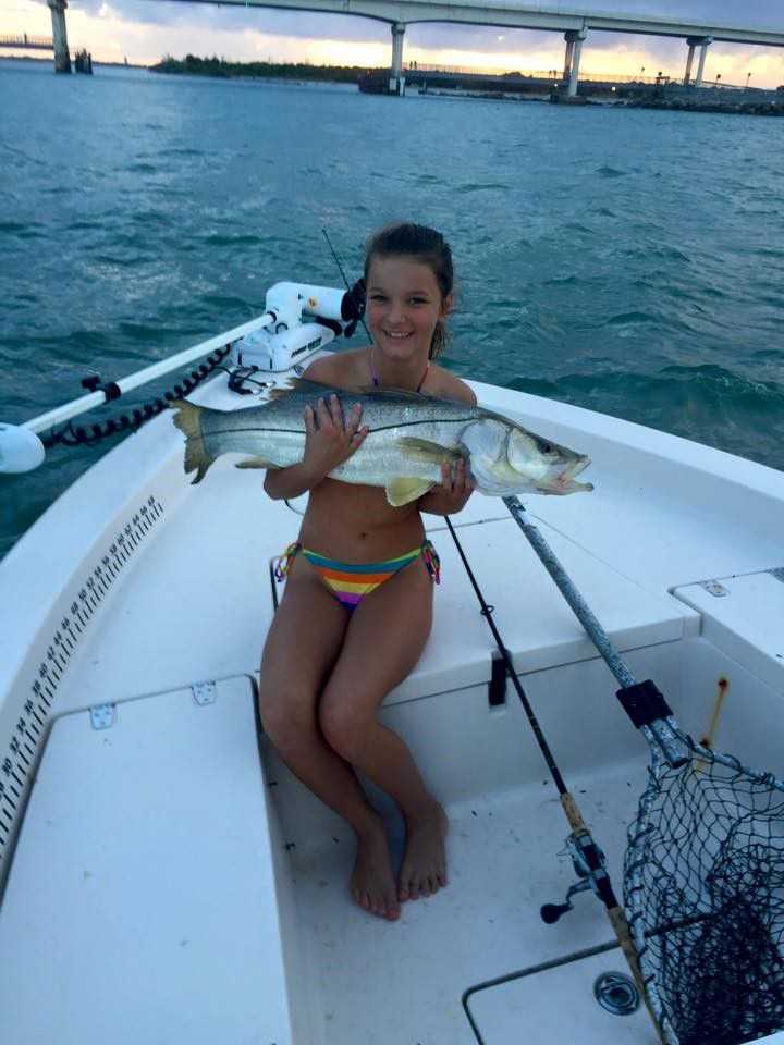 Hannah Krone, 11, with her first snook, a 36-incher caught at the Sebastian Inlet. Hooked and landed all by herself. PHOTO CREDIT: Jess Stanley.