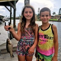 Best friends Logan and Kylah can't get enough of fishing, and worked together to pull this little snapper.