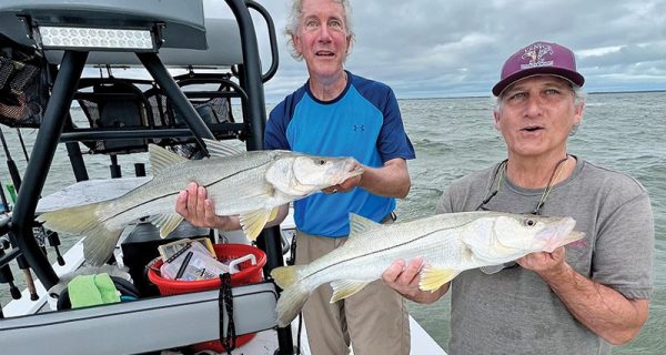 Carl and Larry caught a nice pair of snook as a cold front was coming through.