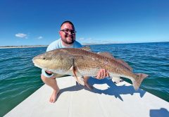Mitchell with a nice beach redfish!