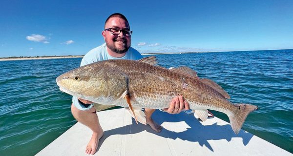 Mitchell with a nice beach redfish!
