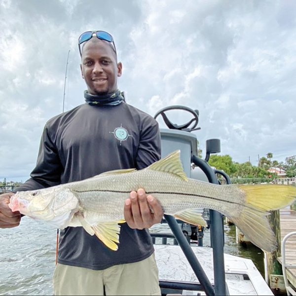 While fishing with Capt. Glyn Ausin of Going Coastal Charters, John caught himself a nice slot snook for dinner!