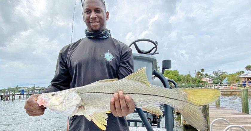While fishing with Capt. Glyn Ausin of Going Coastal Charters, John caught himself a nice slot snook for dinner!