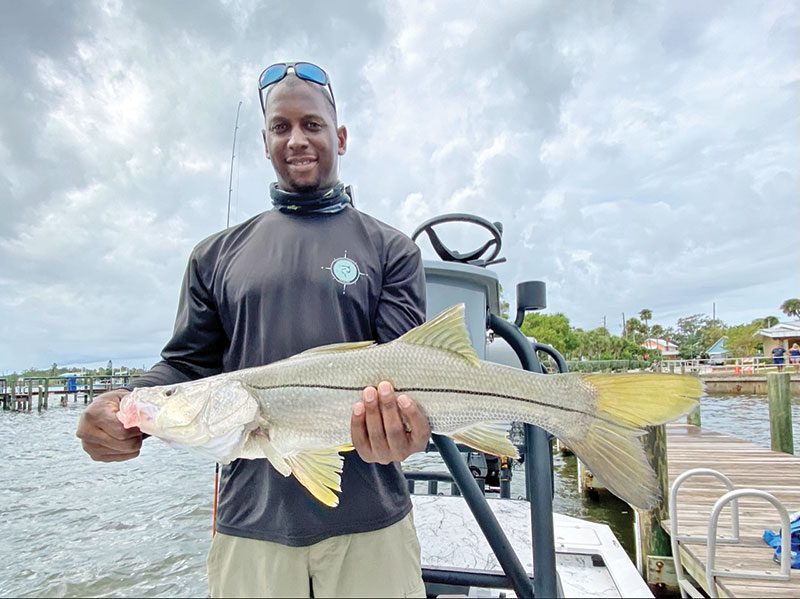 While fishing with Capt. Glyn Ausin of Going Coastal Charters, John caught himself a nice slot snook for dinner!