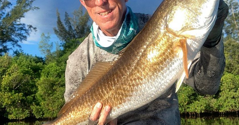 John Lorton of Melbourne with a nice Indian River Lagoon redfish.