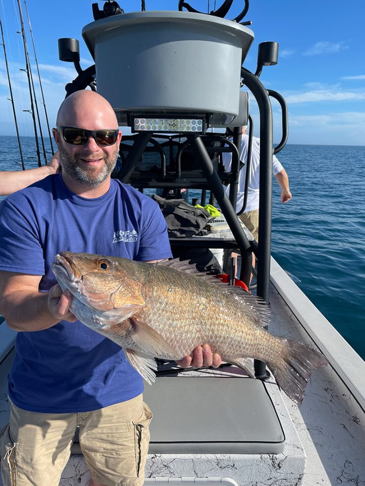 Greg with a big Mangrove snapper.