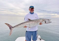 Mark Coomber with a 51lb. kingfish he caught while fishing in 12’ of water off the beach for tarpon on soft plastics.
