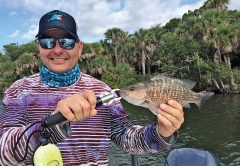 Capt. Justin with a mangrove snapper.