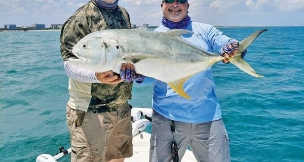 Giant jacks will crush a topwater lure this month.