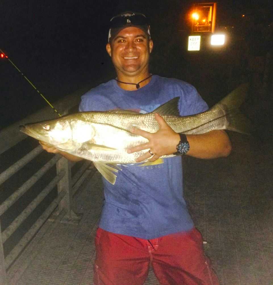 Tom Hodge with a 42-inch snook caught at the Sebastian Inlet. Photo supplied by Tom Hodge.