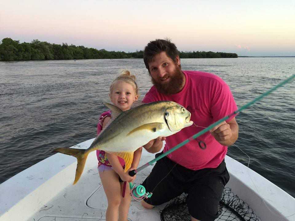Proud dad J.J. Klarmann with his 3 year old daughter who caught her first saltwater fish at the St. Lucie Power Plant. Photo supplied by J.J. Klarmann.