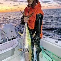 Nick Catsoulis with a yellowfin tuna caught in the Bahamas while high speeding for wahoo.