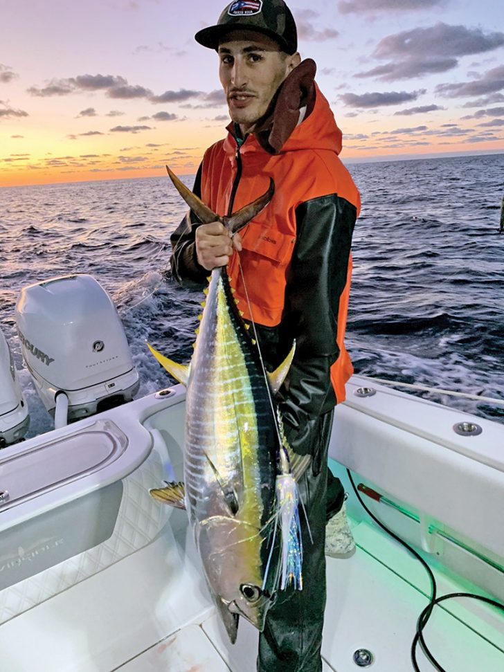 Nick Catsoulis with a yellowfin tuna caught in the Bahamas while high speeding for wahoo.