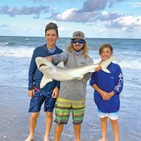 Surf fishing with Capt. Lukas of Cocoa Beach Surf Fishing Chrters, the Brady boys hooked a nice shark!