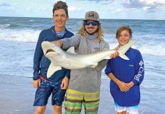 Surf fishing with Capt. Lukas of Cocoa Beach Surf Fishing Chrters, the Brady boys hooked a nice shark!