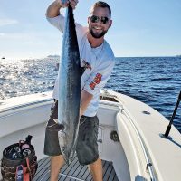 Matt Gonzalez with a 33 pound kingfish caught with a dead ballyhoo on a jig.