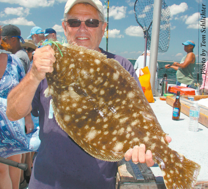 This happy angler drilled a 7-pound pool winning summer flattie on a fluke ball fished beneath a teaser while jigging aboard the open boat Shinnecock Star. He released this trophy to fight another day.