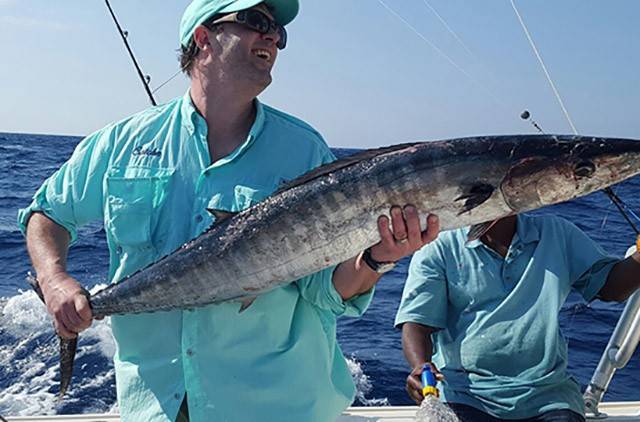 Catching 'hoos on "Catchin" with Capt. Irwin Gibson out of Cape Eleuthera Marina in South Eleuthera. PHOTO CREDIT. Double D & I Sportfishing Adventures.