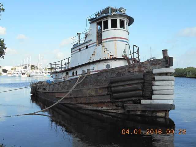 Tug Kathleen moored at St. Lucie County's Harbour Pointe Park staging area. PHOTO CREDIT: St. Lucie County.